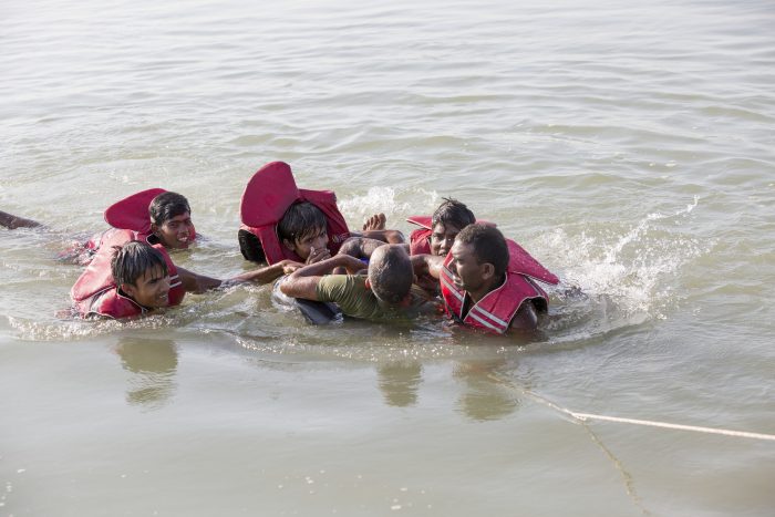 Members of the rescue team in Susta, a small community on the Nepal side of the Nepal-India border, demonstrate how to safely rescue a drowning person from floodwaters. Credit: Lutheran World Relief