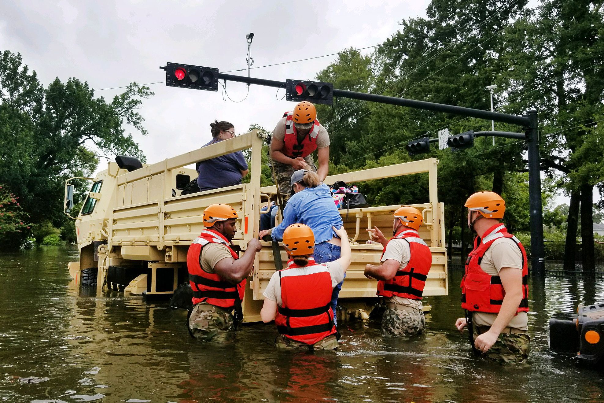 Texas National Guard Soldiers arrive in Houston to rescue stranded residents in flooded areas from the storms of Hurricane Harvey on Aug. 27, 2017.
