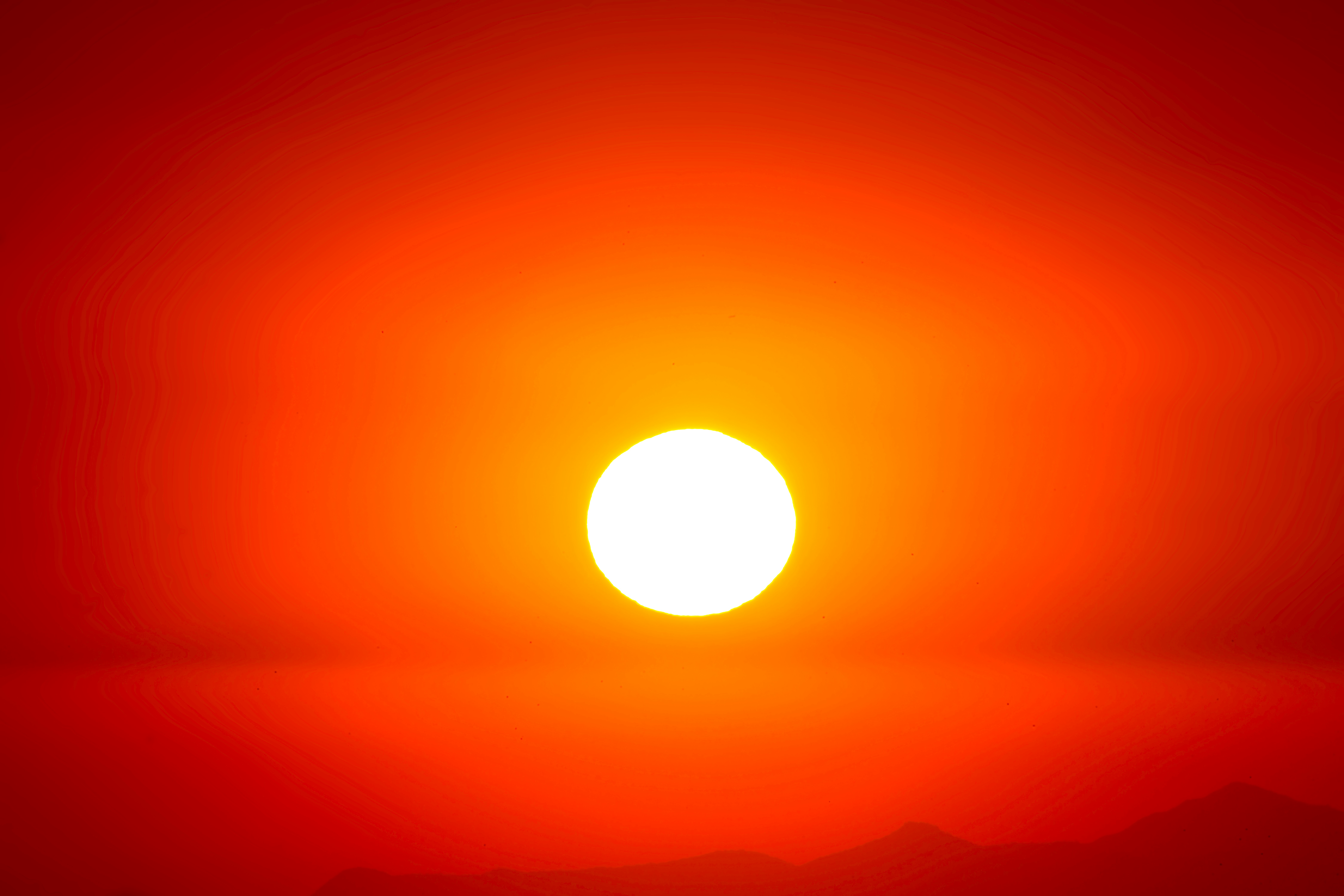 Sun against an orange sky