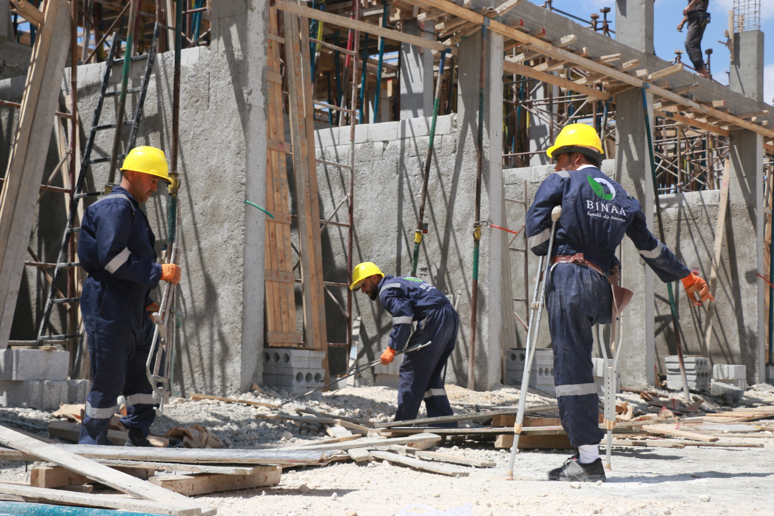 Workers in hard hats at a construction site